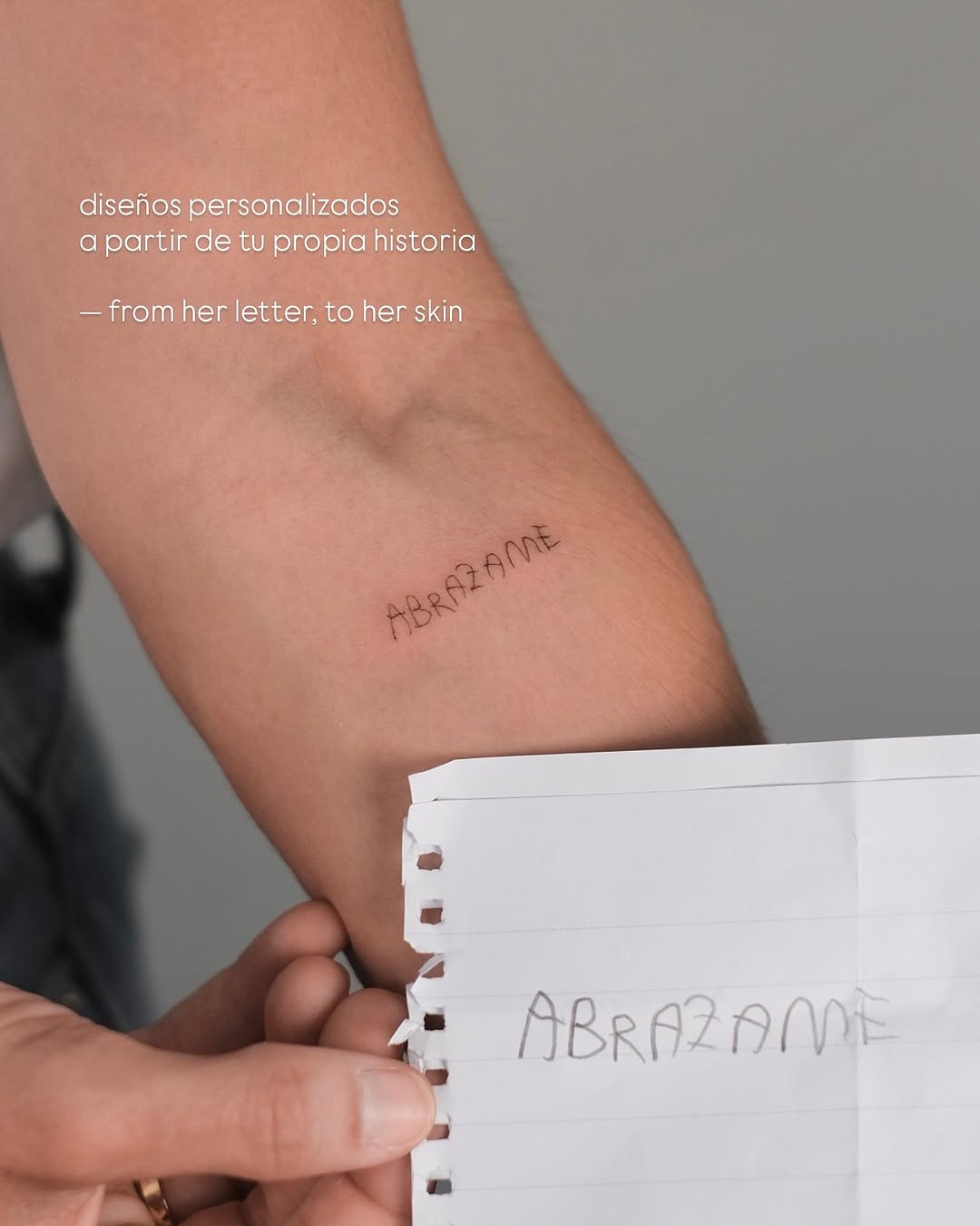 Minimalist forearm script in delicate fine-line lettering