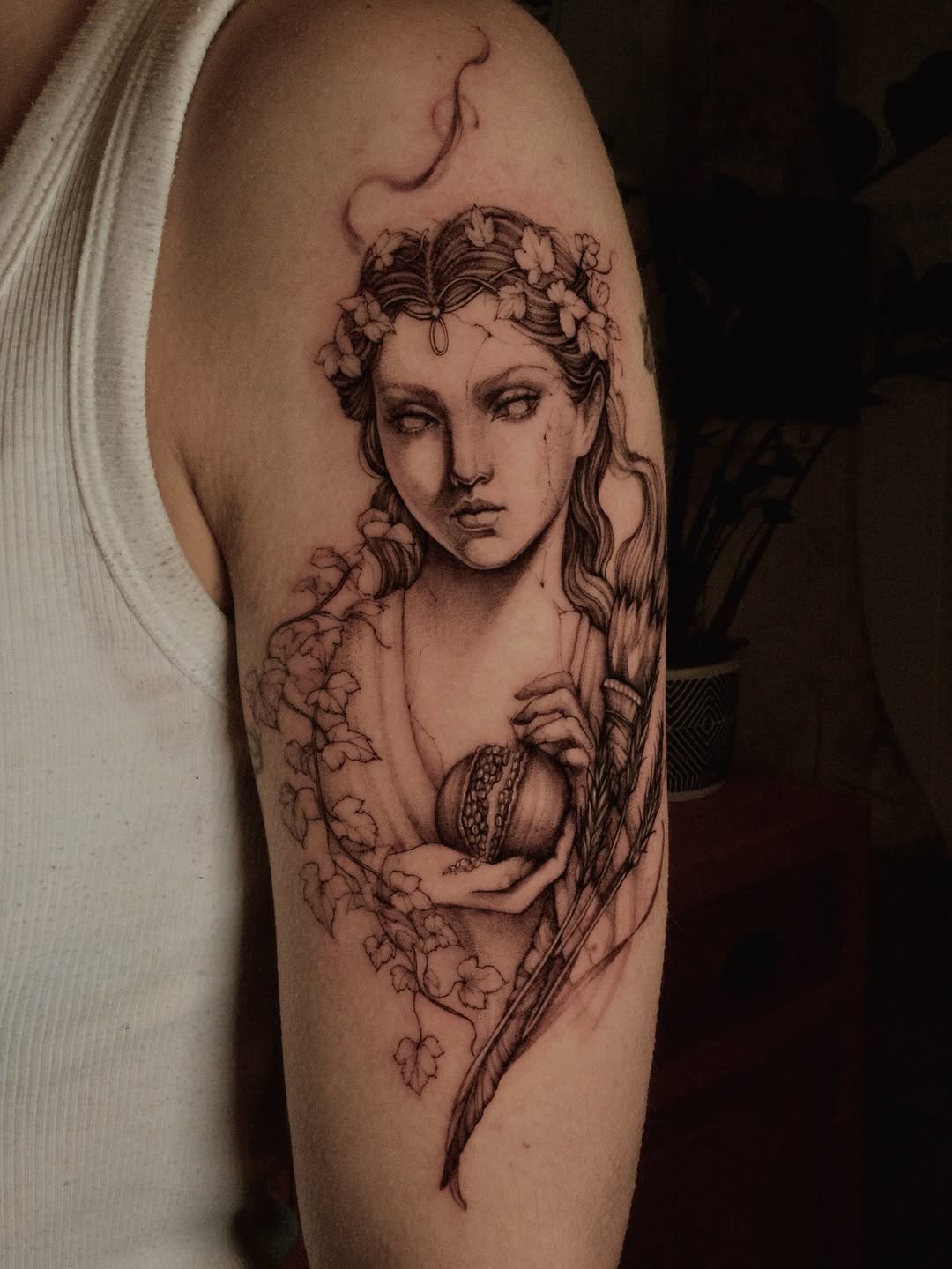Delicate monochrome Persephone portrait with floral crown.