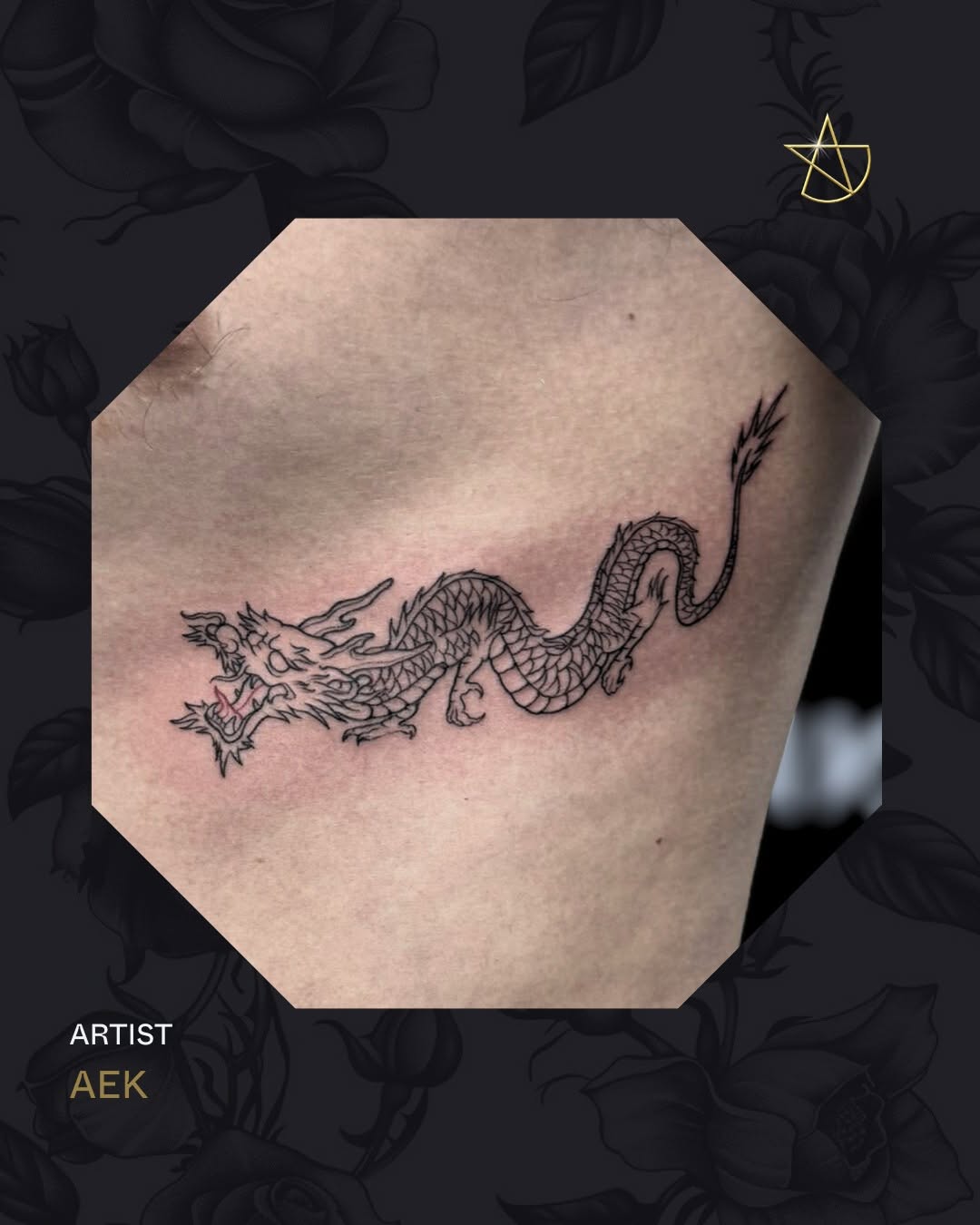 Sinuous black-line dragon coil with intricate scales and fierce head