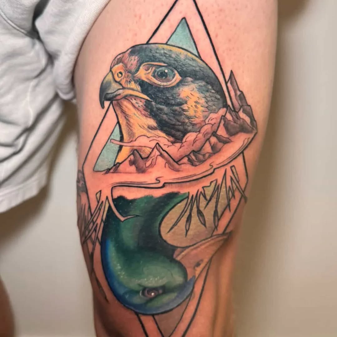 Vibrant geometric eagle head over stylized mountains