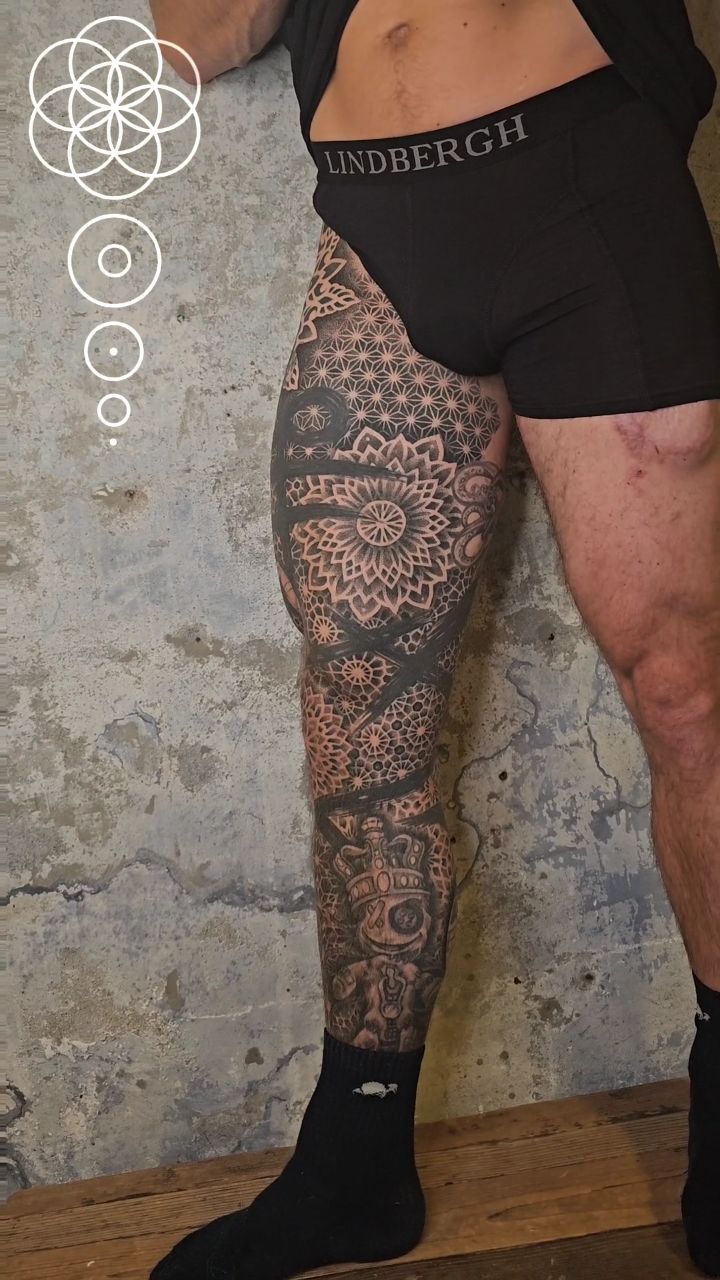 Intricate geometric mandala leg sleeve with dotwork