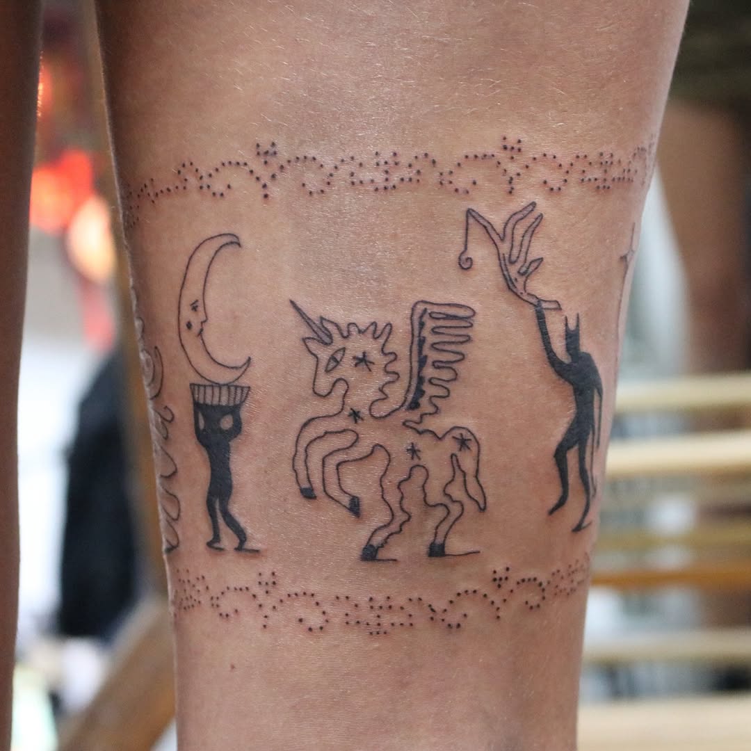 Whimsical folk-art creatures in dotted border band