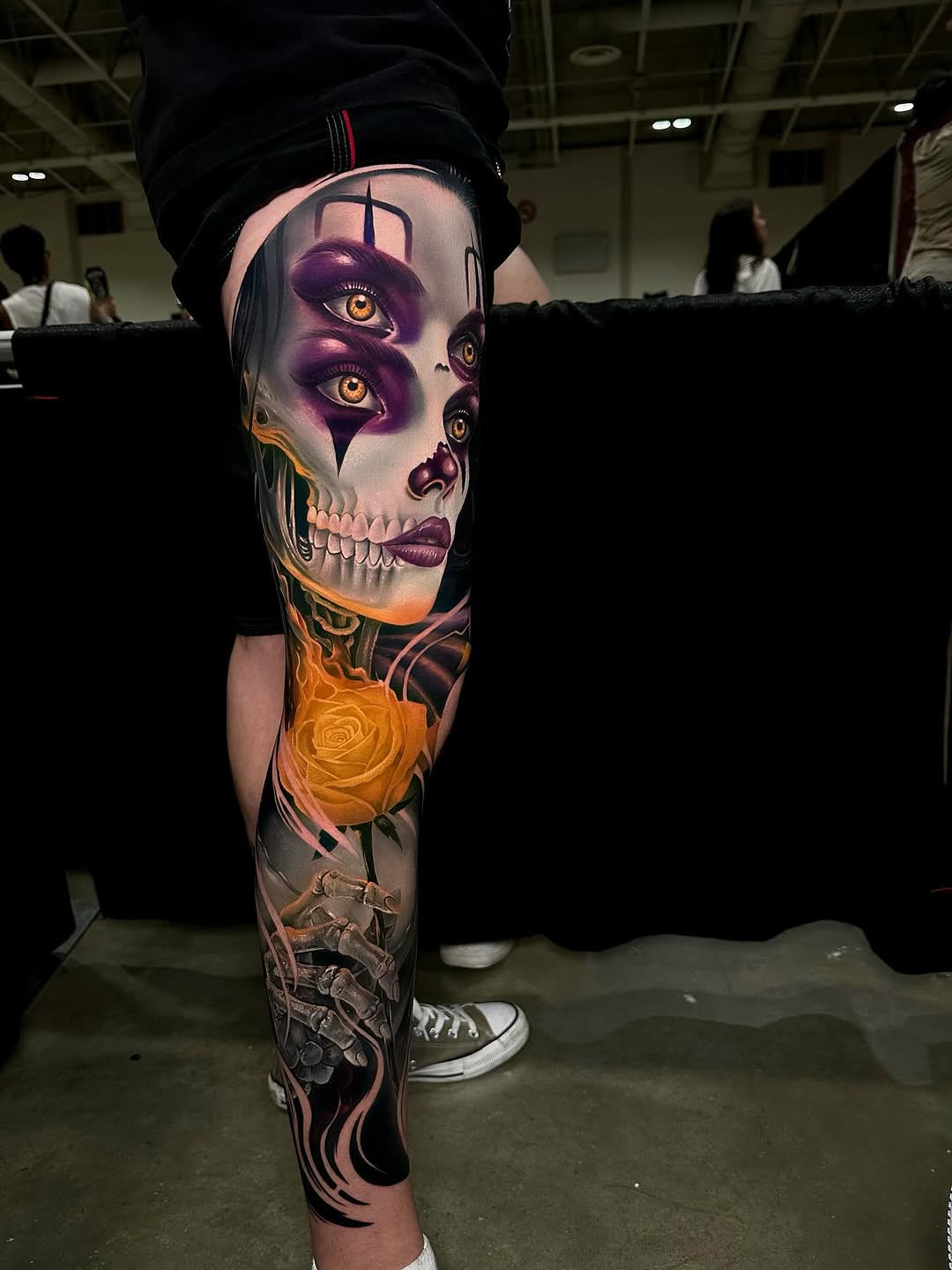 Vibrant full-leg sleeve featuring neon-purple skull and yellow rose
