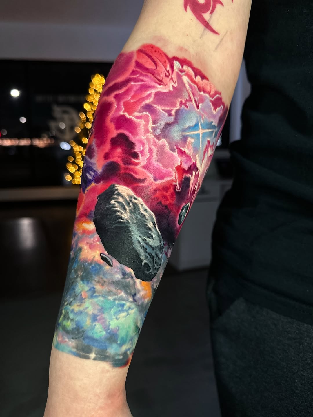 Vibrant watercolor galaxy sleeve with nebula clouds and planets
