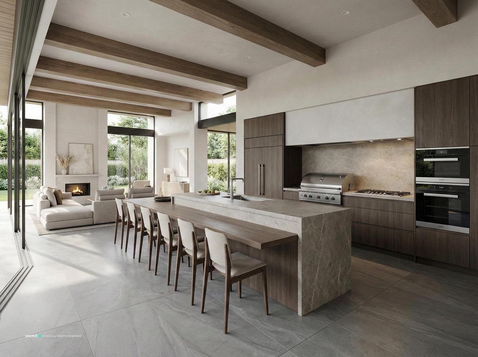 Contemporary kitchen with a long stone island, bar stools and wood cabinetry open to a beamed living area