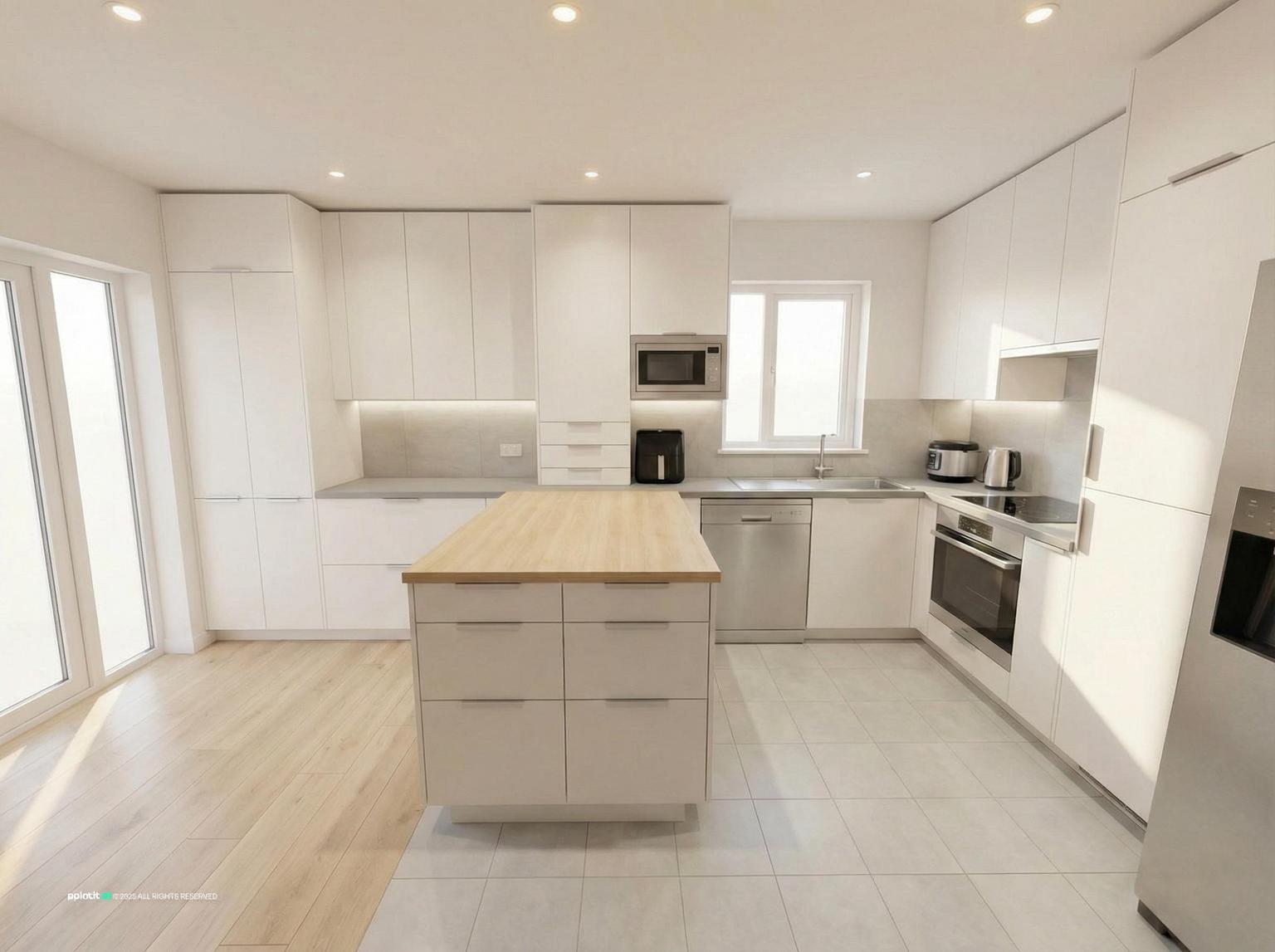 Kitchen with full-height white cabinets, a central island and a garden door