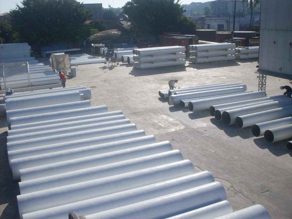 Continuous filament winding machinery for large-scale pipe manufacturing.