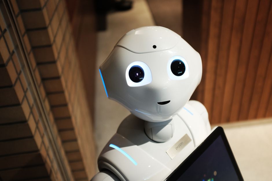 Futuristic humanoid robot representing AI technology