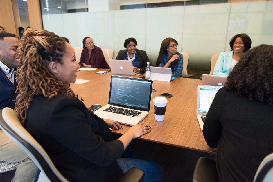 A diverse group of professionals working together in a modern office