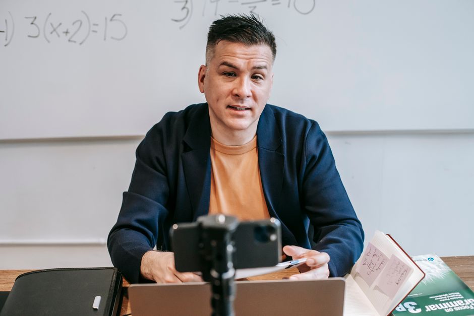 Professional educator conducting an interactive online English class