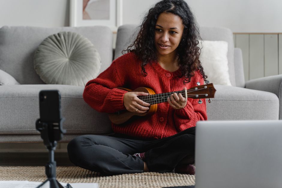 Woman learning ukulele