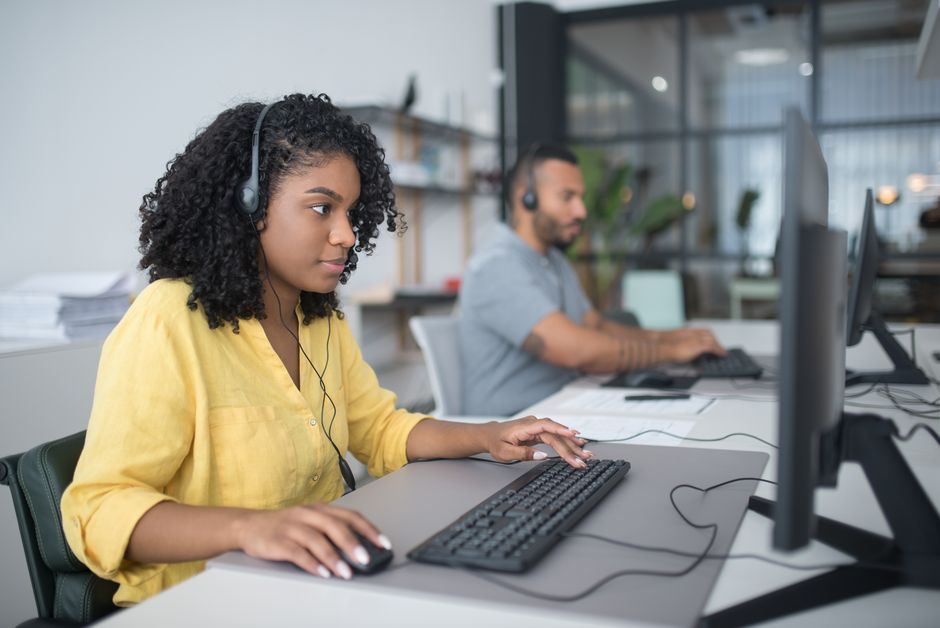 Customer service agents working with headsets
