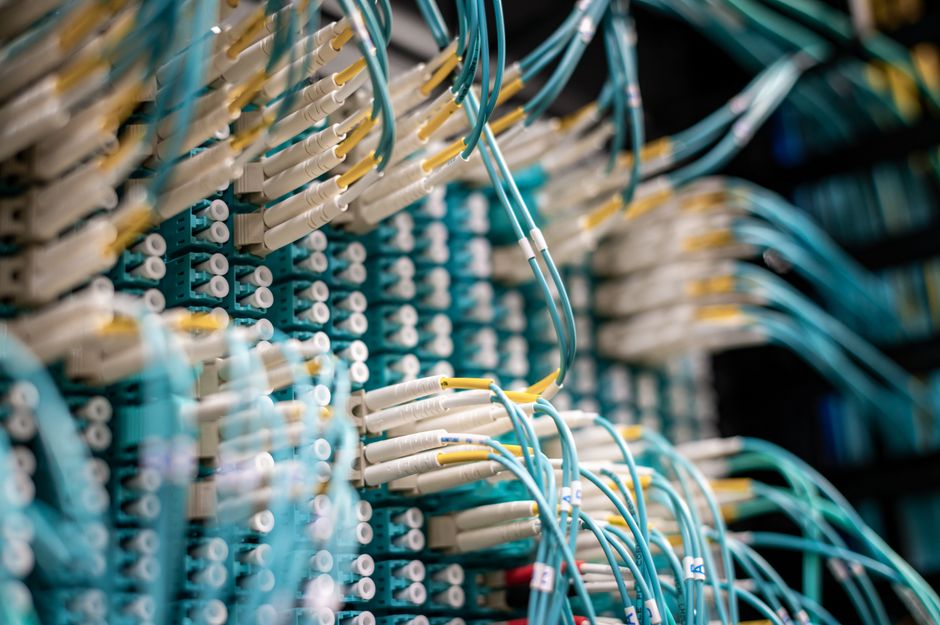 Fiber optic switch with sockets and connected cables