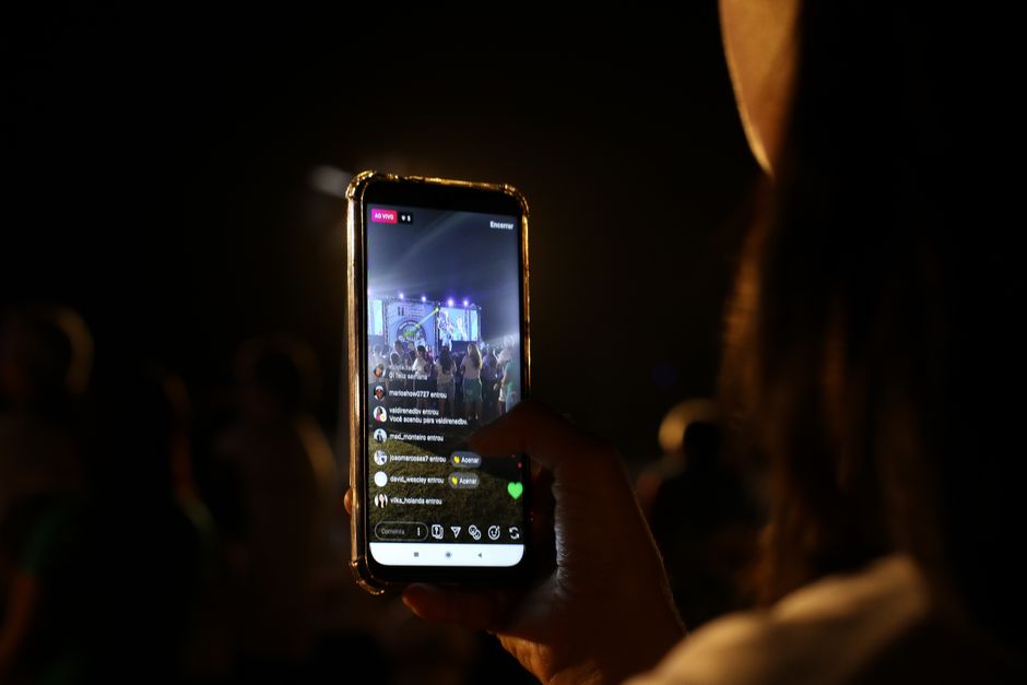 Woman live streaming concert