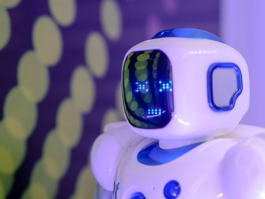 Close-up of a futuristic humanoid robot with a luminescent display