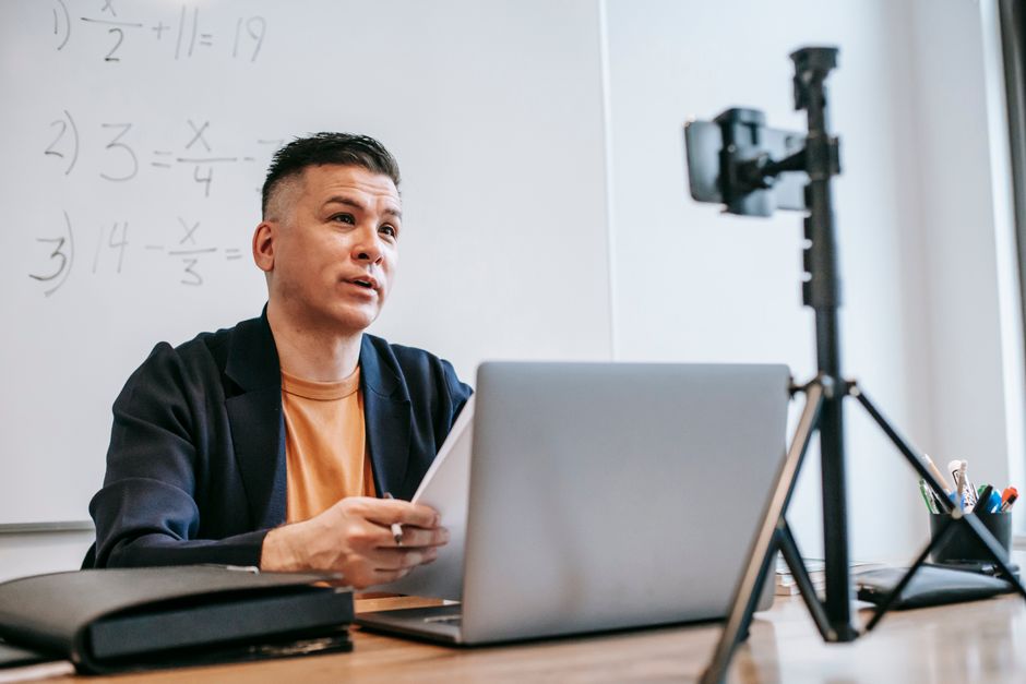 Male instructor teaching online