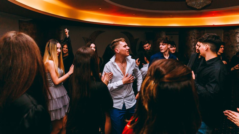 Group dancing at a party