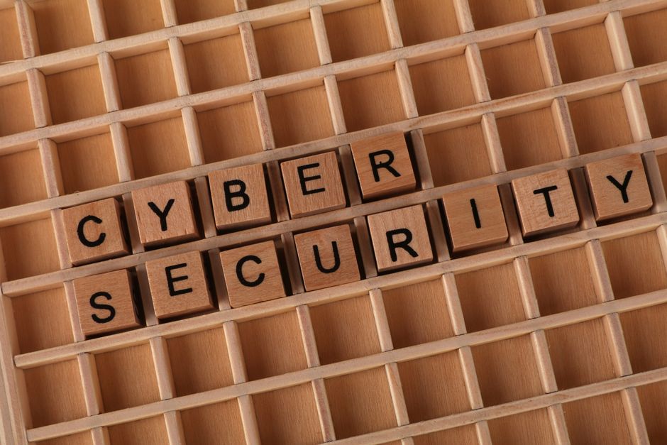 Cyber Security concept with wooden blocks