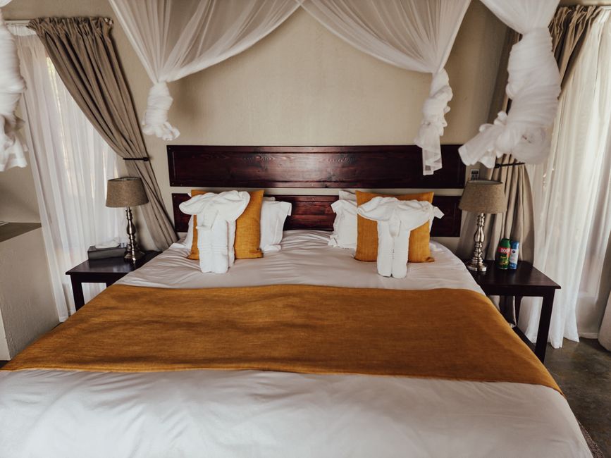 Luxurious bedroom with a stylish canopy bed and soft pillows