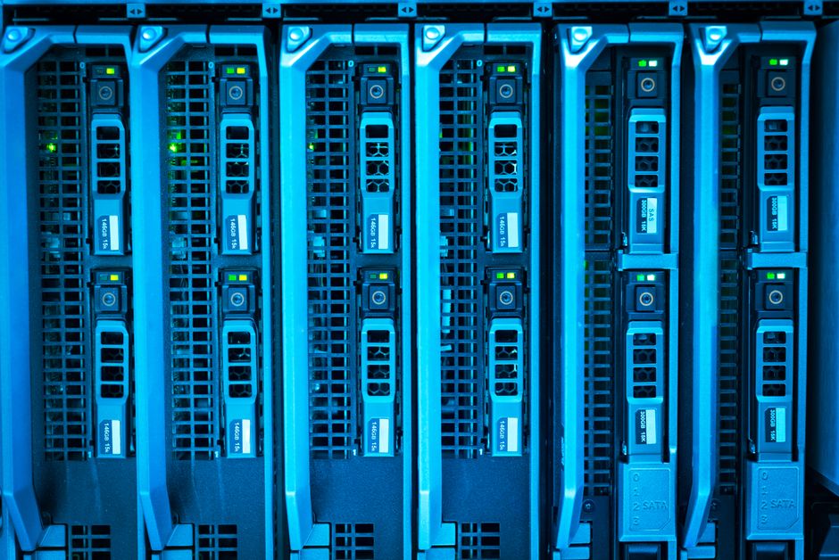 Detailed image of illuminated server racks showcasing modern data center