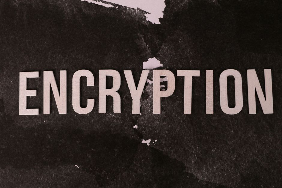 Black and white abstract image with the word ENCRYPTION