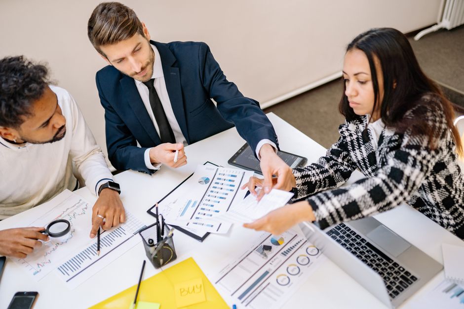 Veriyaz professionals discussing crypto platform development