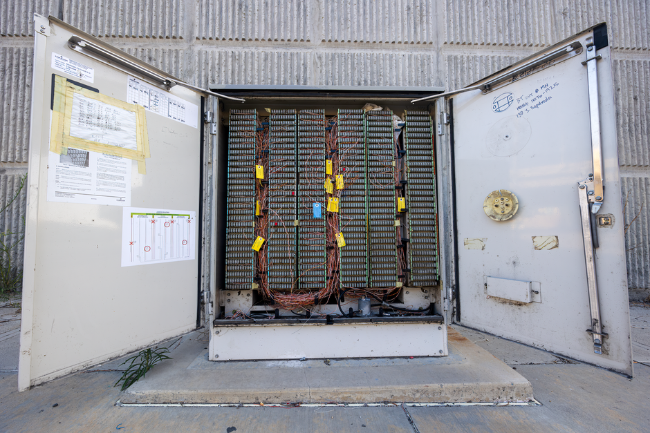 Outdoor telephone junction box showing internal wiring
