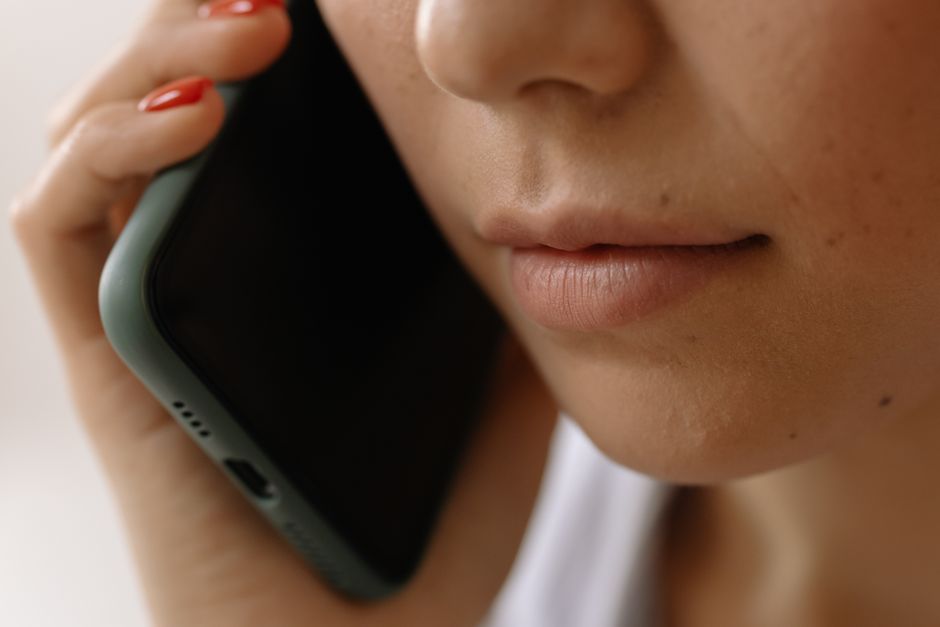 Woman holding smartphone to her ear