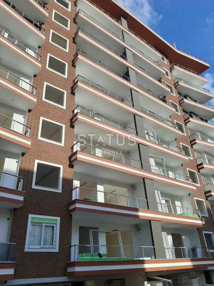 Квартира 2+1, с отдельной кухней в 300 метрах от моря, в Махмутларе, 125 кв.м. фото 1