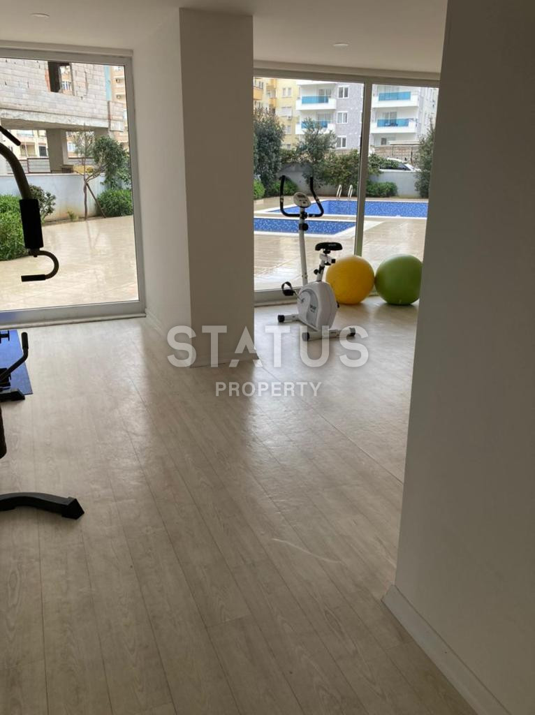 Апартаменты 1+1 в районе Махмутлар, 70 м2 фото 12