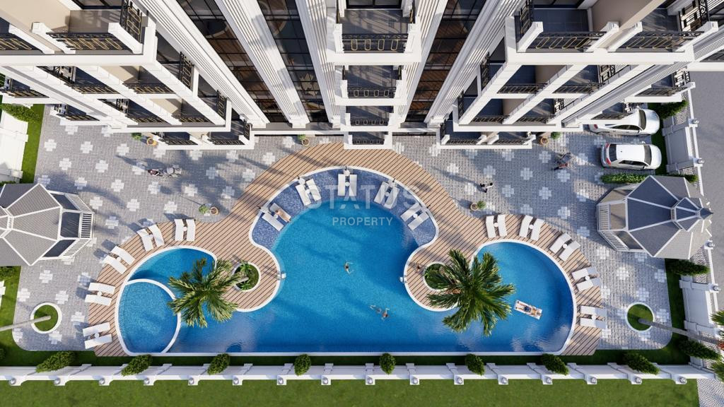 Комплекс на этапе строительства в Авсалларе, квартиры 1+1 в окружении природы от 45 м2. фото 3