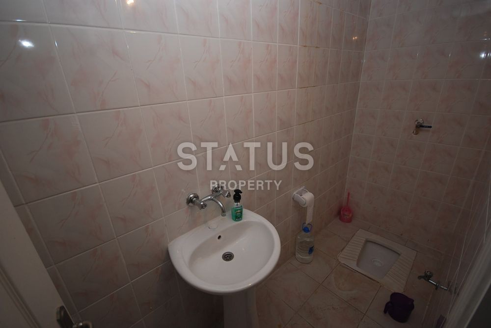 Недорогая квартира в центре Махмутлара с недорогим обслуживанием комплекса. фото 12