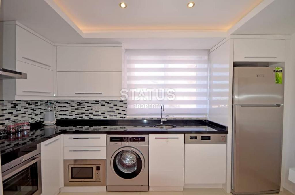 Cozy furnished 1+1 apartment with a view of the sea and the fortress in the center of Alanya, 55 m2. фото 12