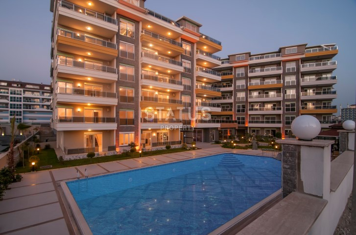 Апартаменты 1+1 в живописном районе Кестель, всего в 50 метрах от моря, 70 кв.м. фото 4