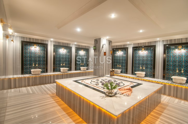 Апартаменты 1+1 в живописном районе Кестель, всего в 50 метрах от моря, 70 кв.м. фото 8