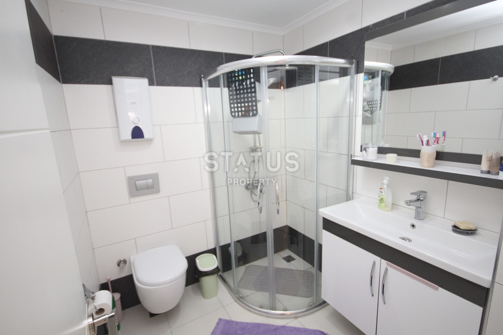 Апартаменты 1+1 в живописном районе Кестель, всего в 50 метрах от моря, 70 кв.м. фото 14