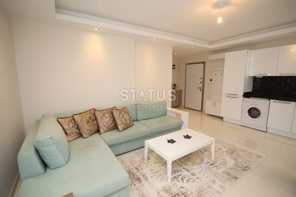 Апартаменты 1+1 в живописном районе Кестель, всего в 50 метрах от моря, 70 кв.м. фото 15