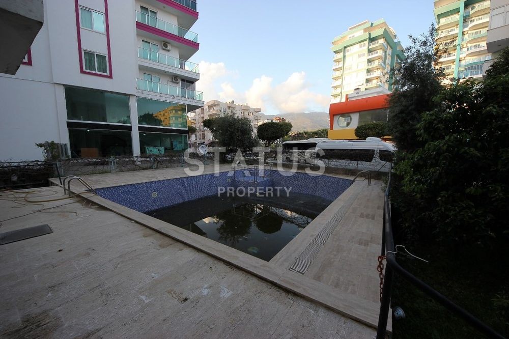 Недорогие трехкомнатные апартаменты на побережье района Махмутлар,95 м2 фото 16