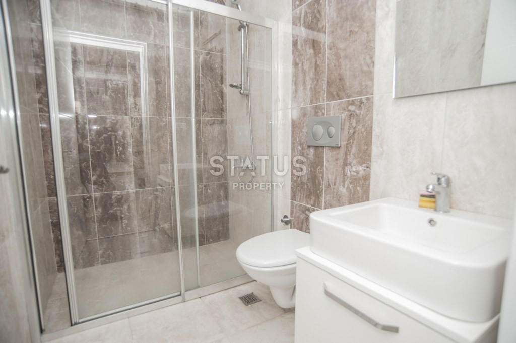 Меблированный дуплекс 3+1 и апартаменты с видом на море 2+1 в элитном комплексе у моря в Кестеле. фото 8