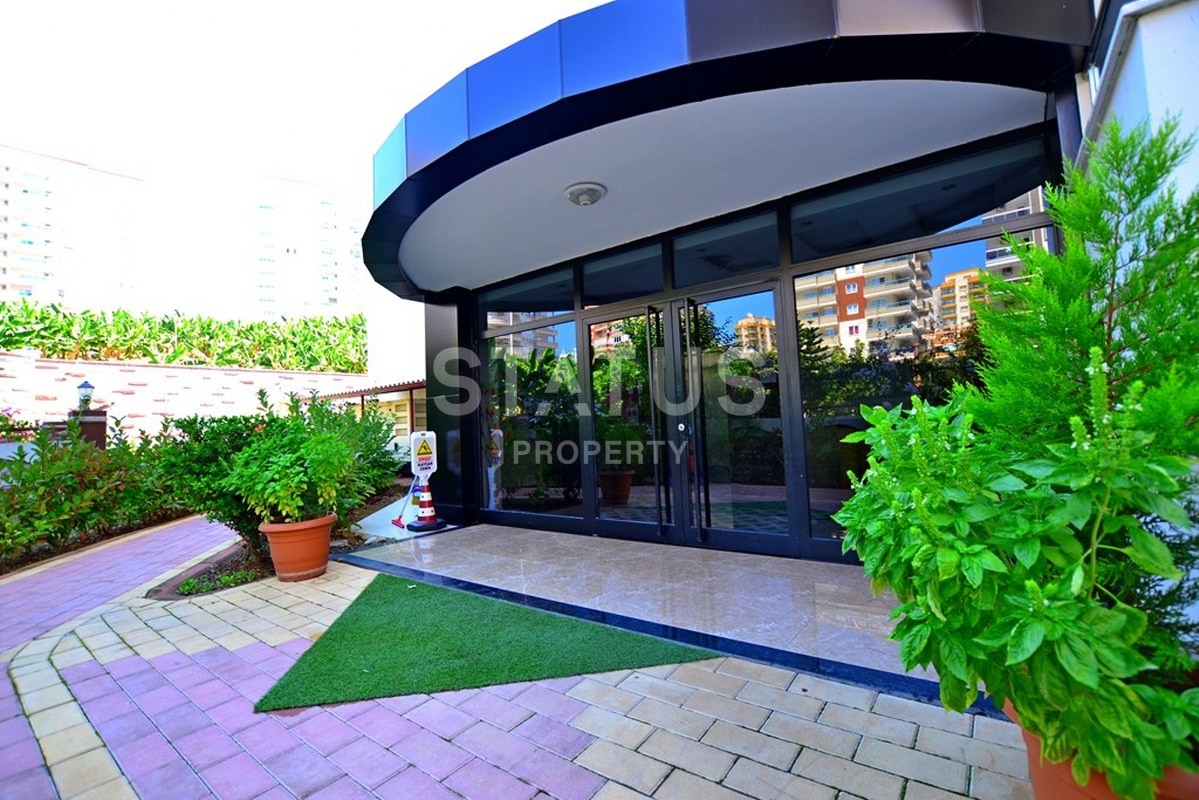 Новая двухкомнатная квартира в центре района Махмутлар , 60м2. фото 8