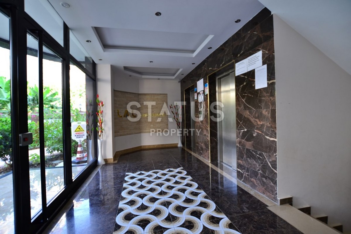 Новая двухкомнатная квартира в центре района Махмутлар , 60м2. фото 9