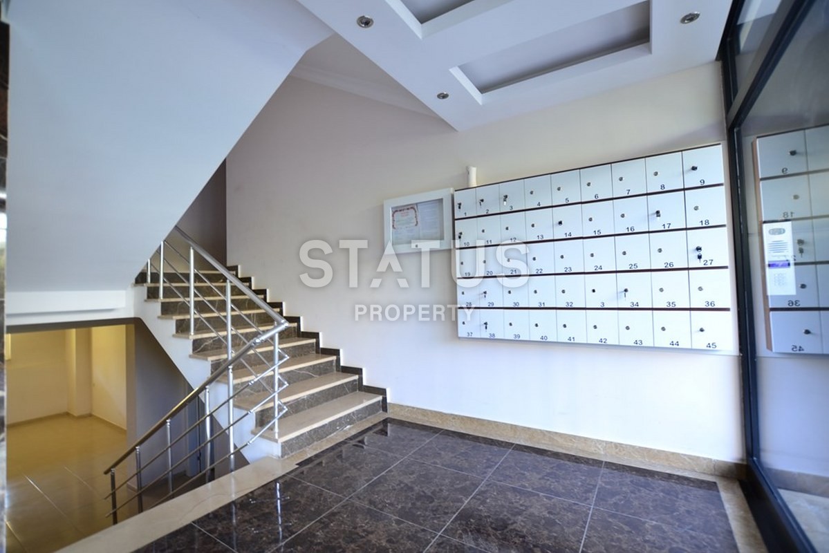 Новая двухкомнатная квартира в центре района Махмутлар , 60м2. фото 21