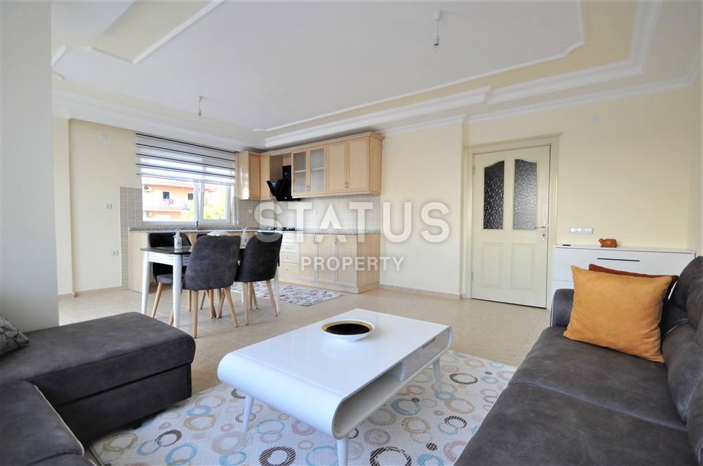 Трехкомнатные апартаменты в добротном доме в районе Тосмур. Хорошая цена! 120 кв.м. фото 4