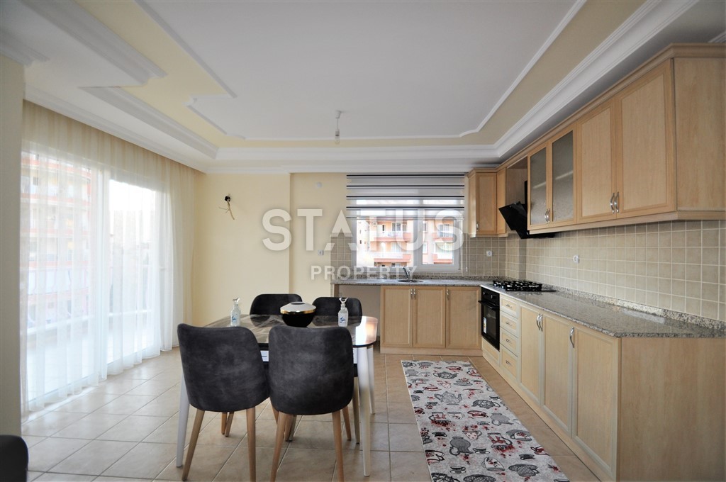 Трехкомнатные апартаменты в добротном доме в районе Тосмур. Хорошая цена! 120 кв.м. фото 8