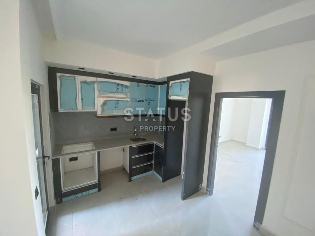 Новая квартира 1+1 в районе Махмутлар, 55 м2 фото 3