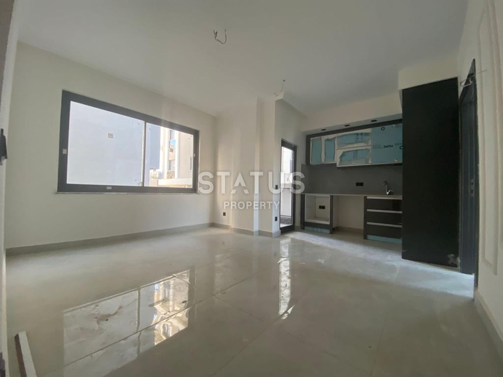 Новая квартира 1+1 в районе Махмутлар, 55 м2 фото 4