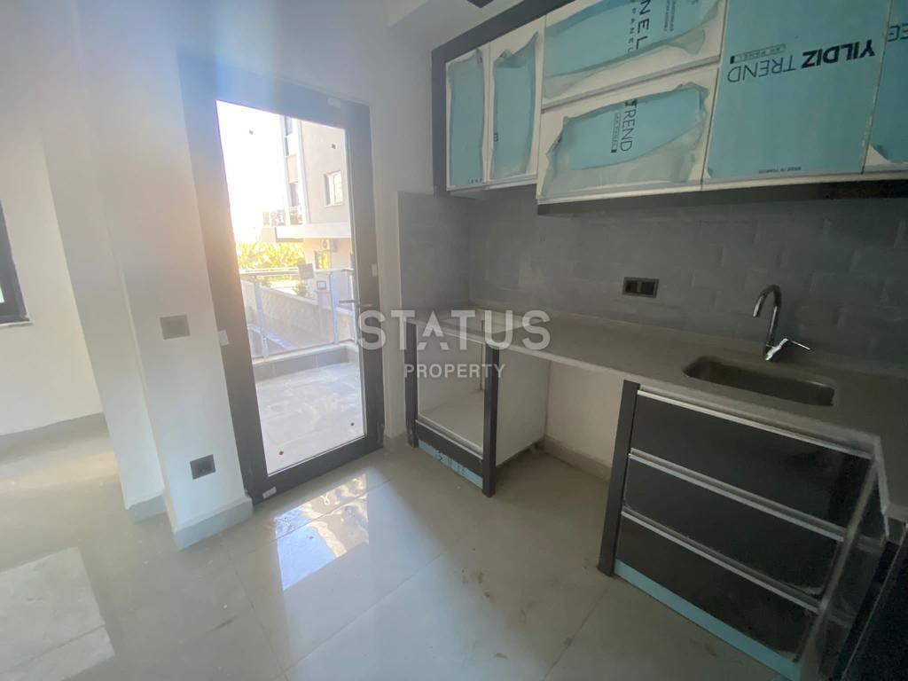 Новая квартира 1+1 в районе Махмутлар, 55 м2 фото 5