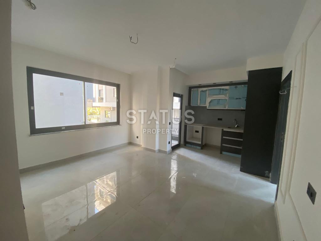 Новая квартира 1+1 в районе Махмутлар, 55 м2 фото 6