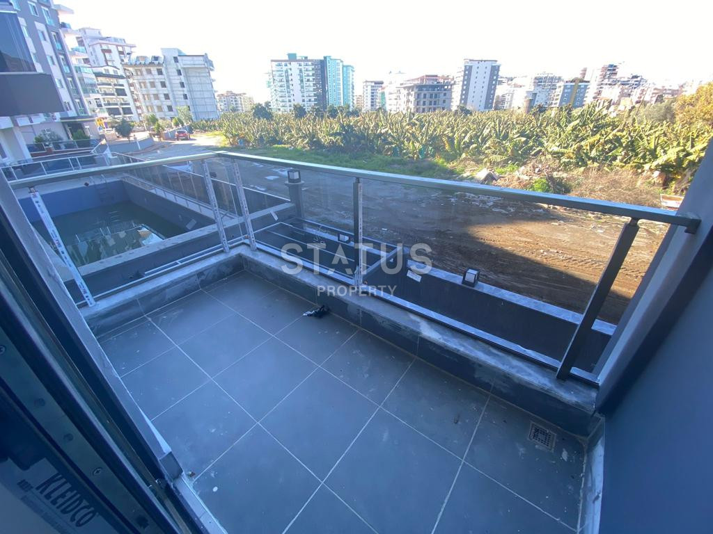 Новая квартира 1+1 в районе Махмутлар, 55 м2 фото 7