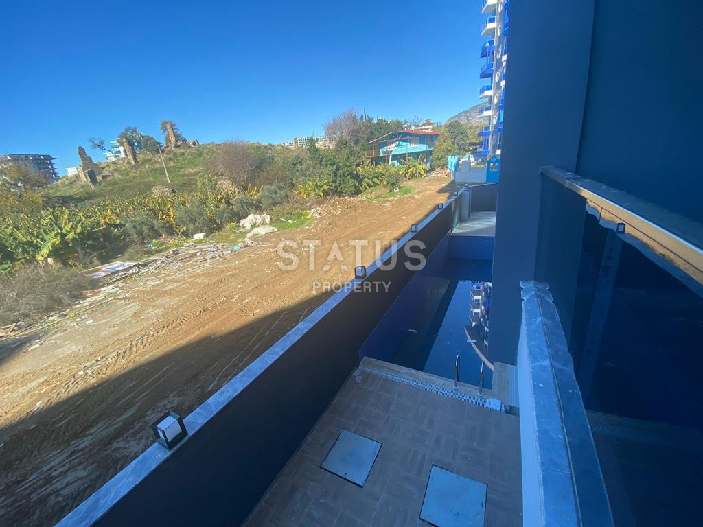 Новая квартира 1+1 в районе Махмутлар, 55 м2 фото 8